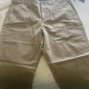 2 men’s Banana Republic flat front khakis. 1 pair nwt, other  worn only once